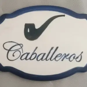 Placa de señalamiento baño