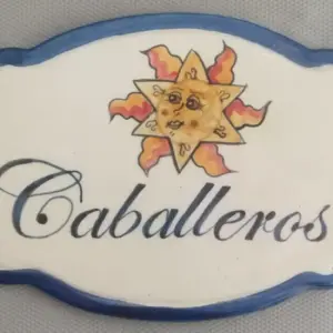 placa de señalamiento caballeros